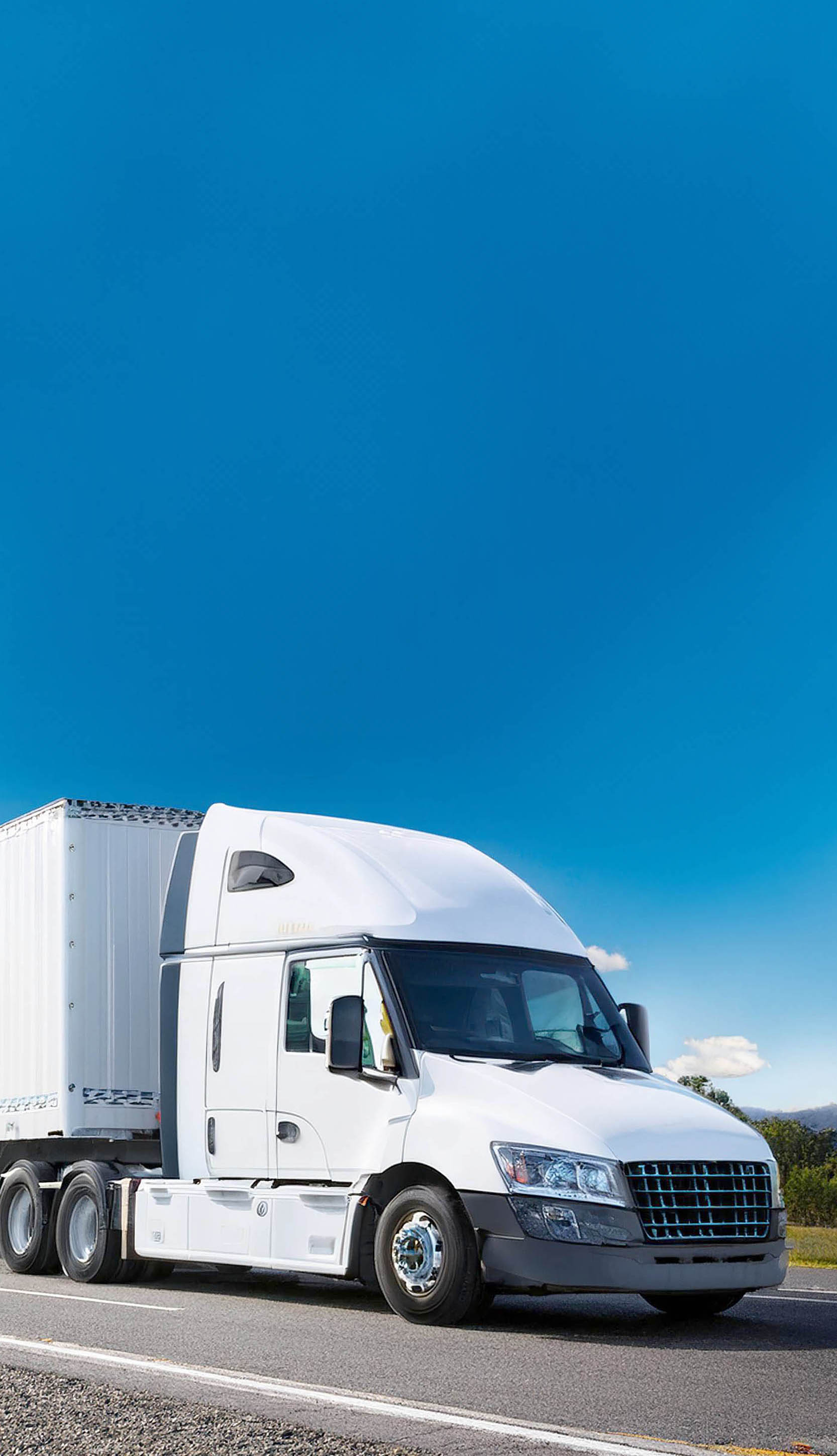 Truck driving in sunshine