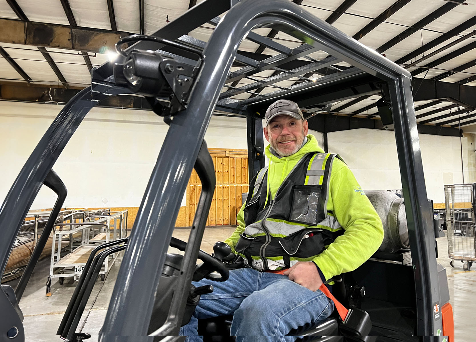 Warehouse worker on forklift